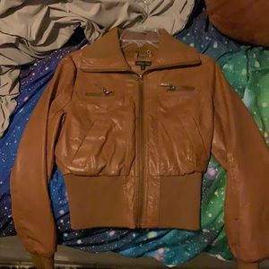 A cute brown jacket, size small,